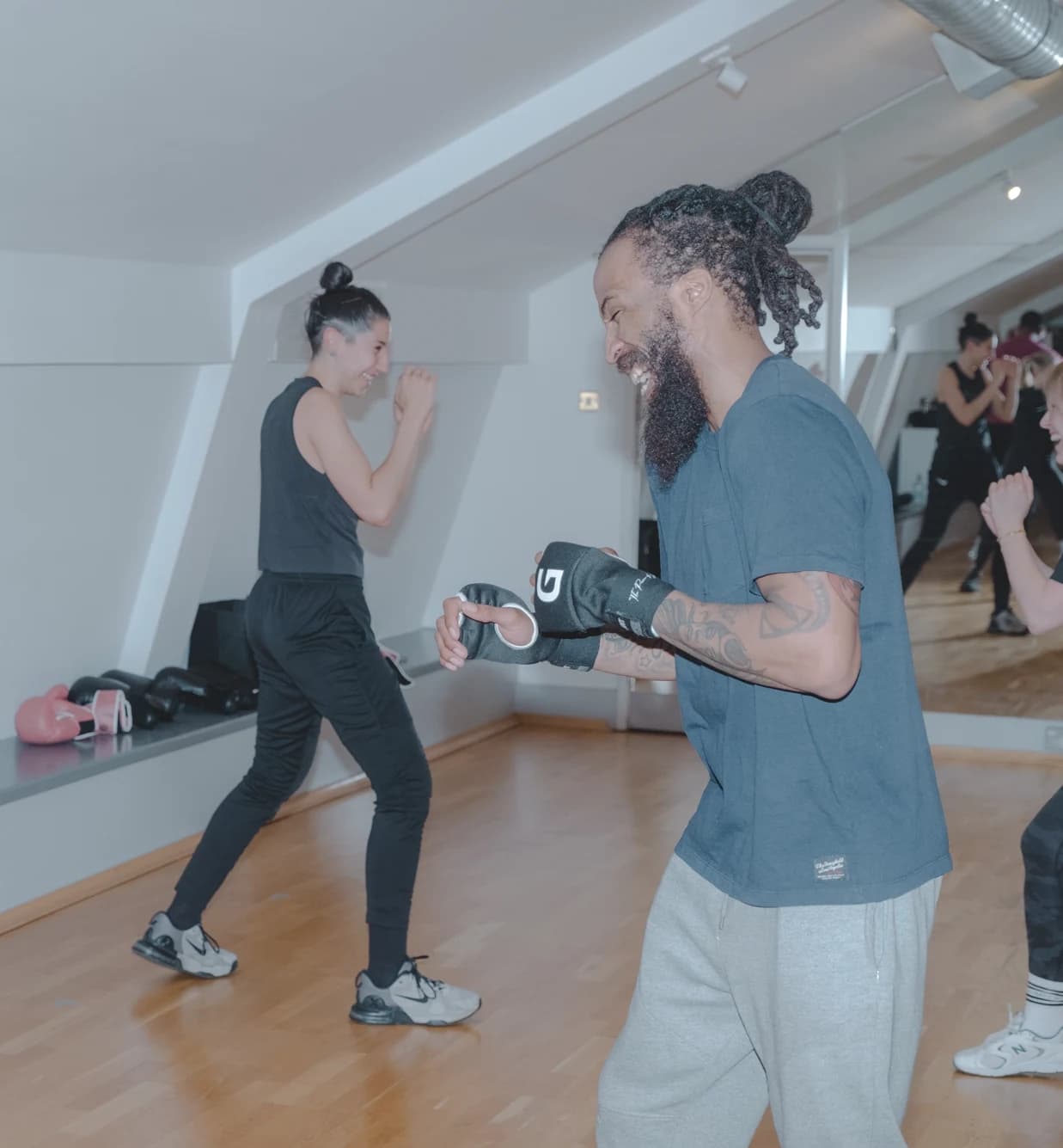 Members boxing training at Body Works West