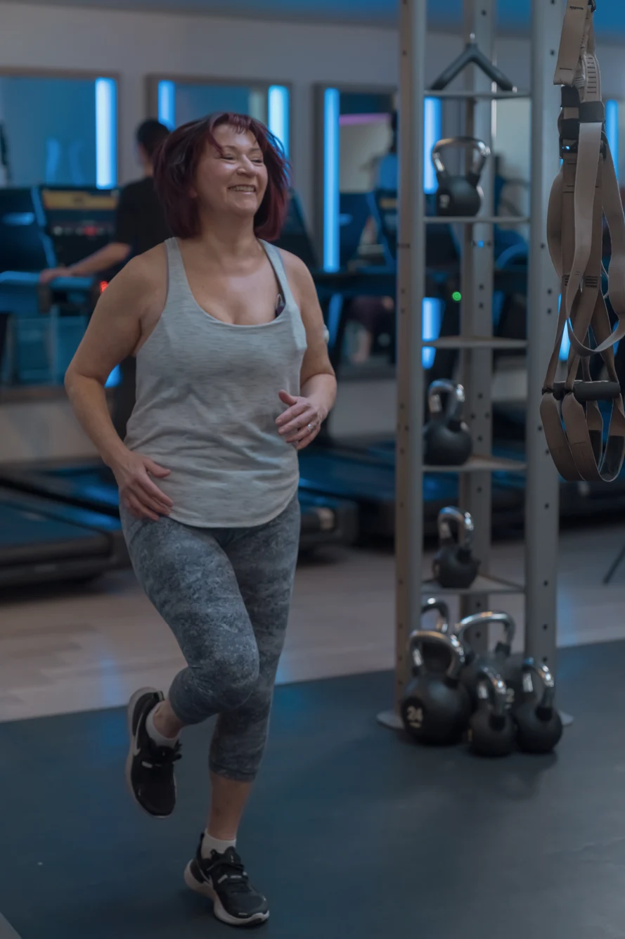 Woman doing a cardio aerobics exercise at Body Works West