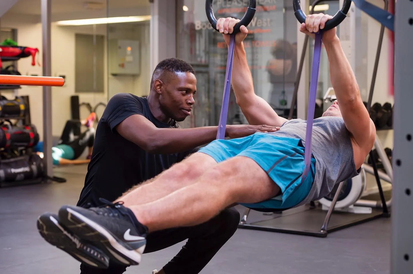 Instructor guiding members through a class at Body Works West