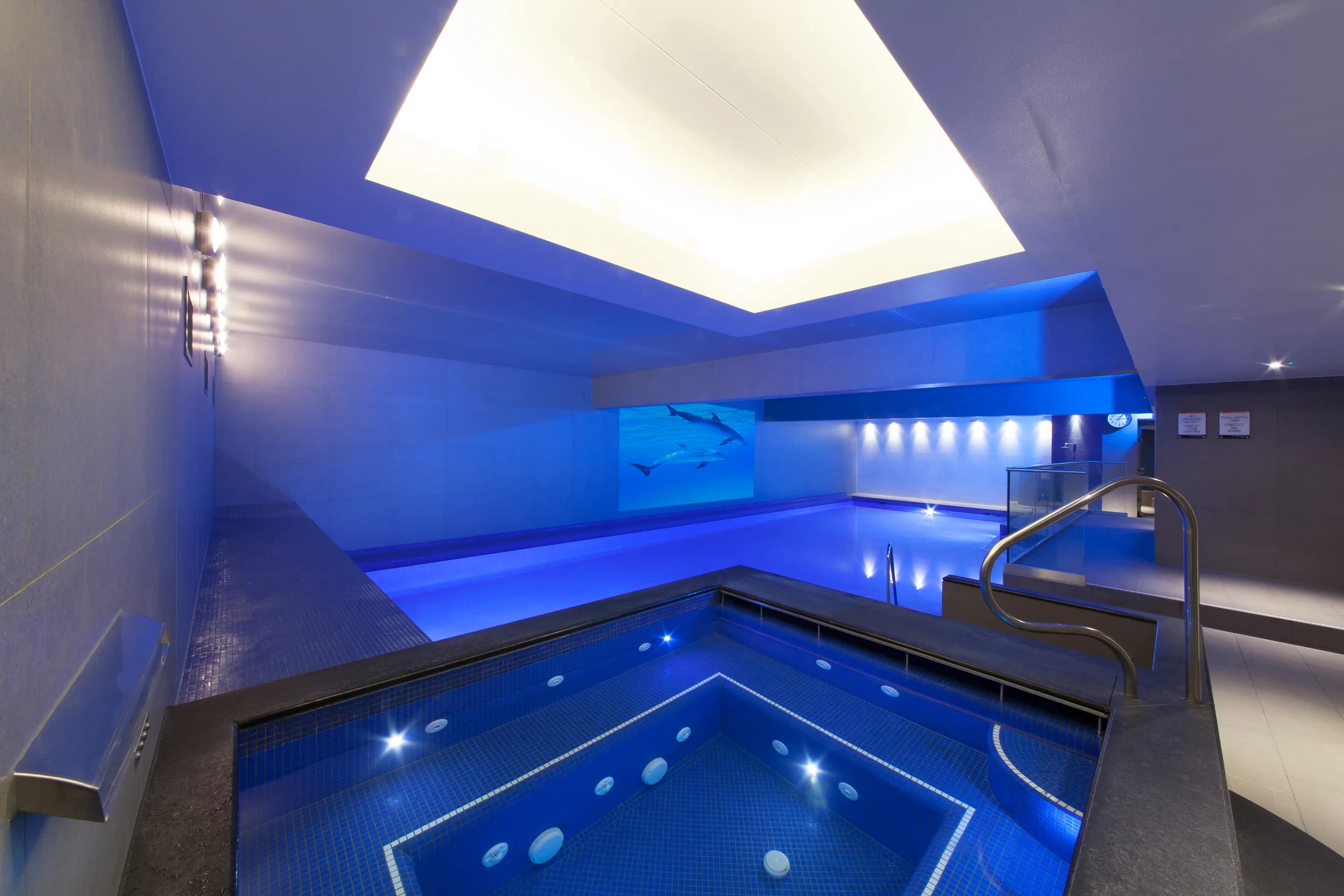 Indoor swimming pool and jacuzzi at the Body Works West Pool & Spa